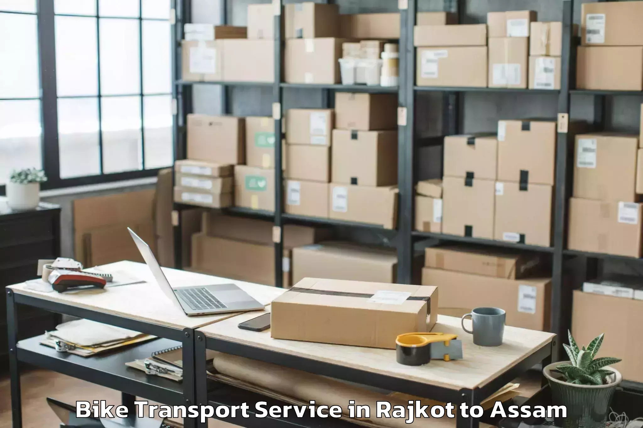 Professional Rajkot to Makum Bike Transport